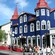 A quaint neighborhood featuring a charming Victorian style sidewalk café